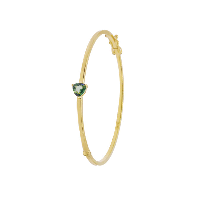 Handcrafted yellow gold bangle bracelet embellished with pear-cut emerald gemstone, wraps gently around the wrist. Perfect for a day to day dress up, complementing tanned skin complexions for ultra-radiance.  Estimated Coloured Stone Weight: 0.65 Carat of Emerald  Gold Weight: 18K Yellow Gold