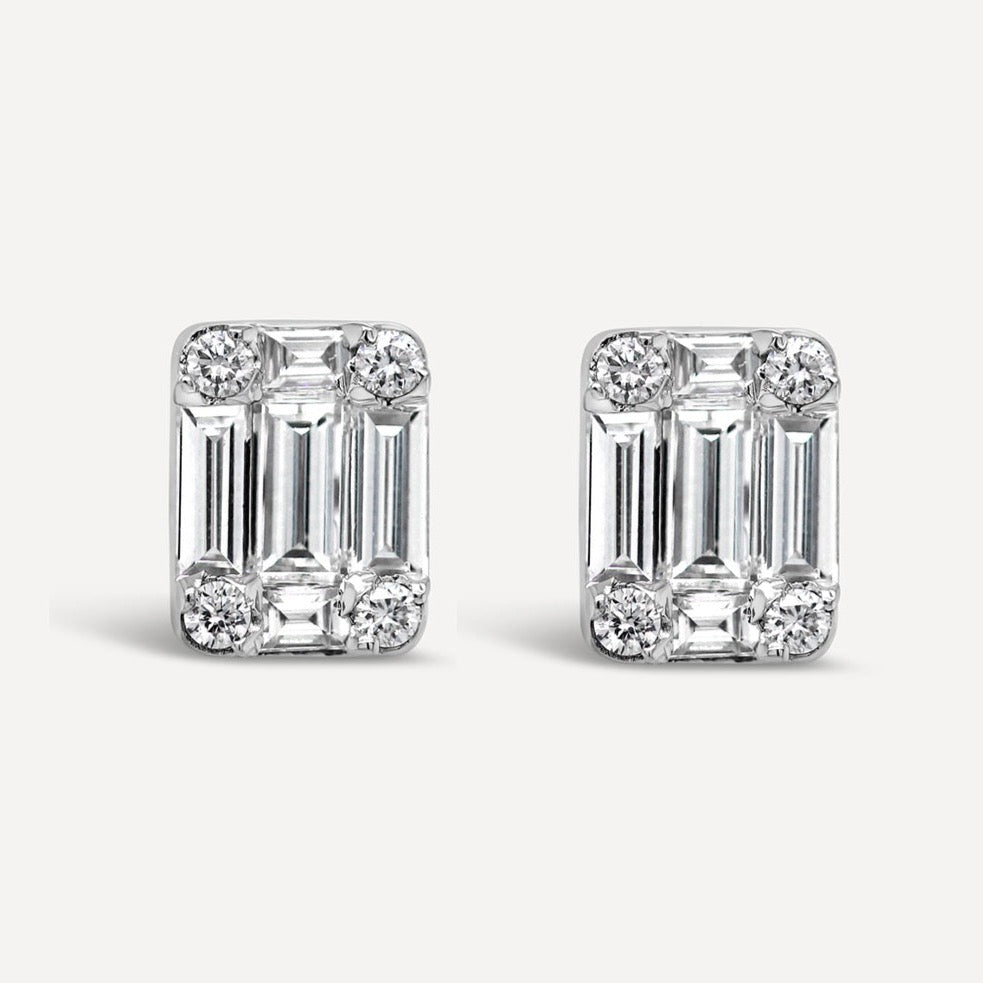 Sophisticated emerald diamond studs come in an invisibly ardent shape. Perfect for women who enjoy exuberant embellishments that highlights clarity with confidence.   Estimated Diamond Weight: 0.95Carat Of Diamond   Gold Weight: 18K White Gold