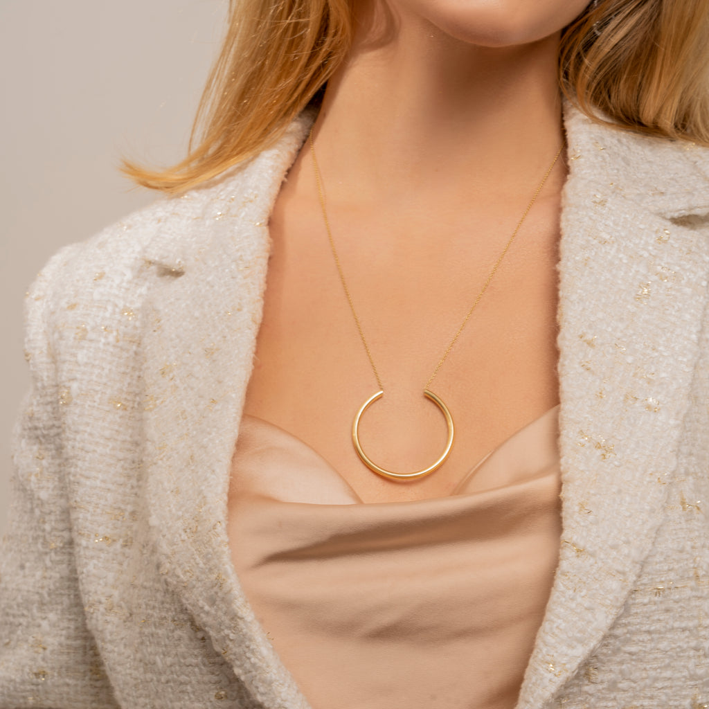 Sautoir long yellow gold necklace with almost a full blooming moon shape. Perfect for a daily assortment with layering necklaces.  Gold Weight: 18K Yellow Gold