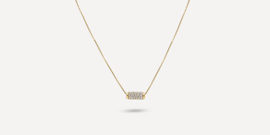 This short white diamond swivel necklace sits perfectly in your feminine décolleté. Yellow gold chain necklace with a melee embellished white diamond charm.   Gold Weight: 18K Yellow Gold 